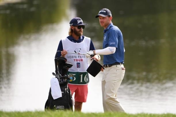 Jared Wolfe with his caddie at the 18th green during the third round of the Memorial Health Championship presented by LRS at Panther Creek Country...