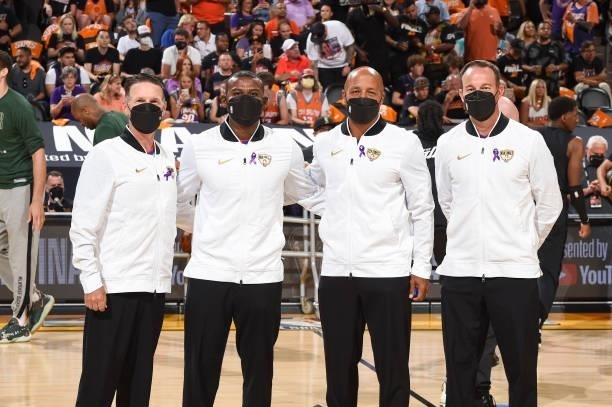 Referee Pat Fraher, referee James Williams, referee Marc Davis, and referee Josh Tiven pose for a photo before the game between the Phoenix Suns and...