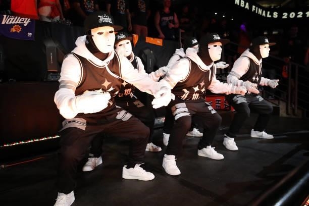July 17: Hip hop dance crew the Jabbawockeez perform during halftime of the Milwaukee Bucks game against the Phoenix Suns during Game Five of the...