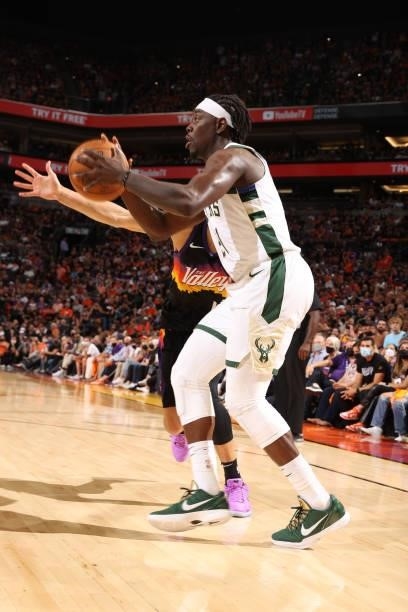 July 17: Jrue Holiday of the Milwaukee Bucks passes the ball against the Phoenix Suns during Game Five of the 2021 NBA Finals on July 17, 2021 at...