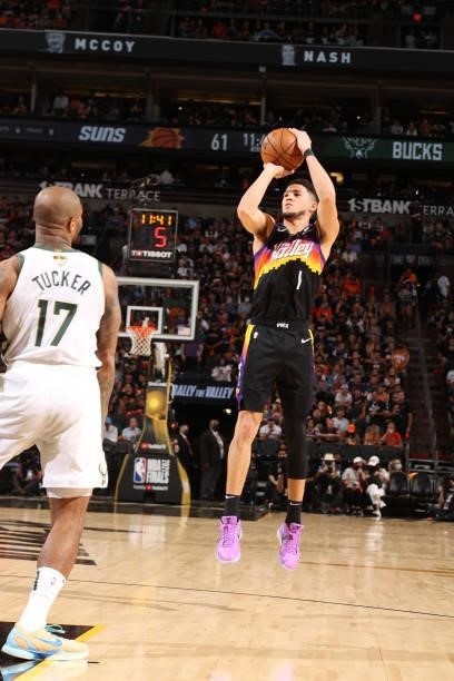 July 17: Devin Booker of the Phoenix Suns shoots the ball against the Milwaukee Bucks during Game Five of the 2021 NBA Finals on July 17, 2021 at...