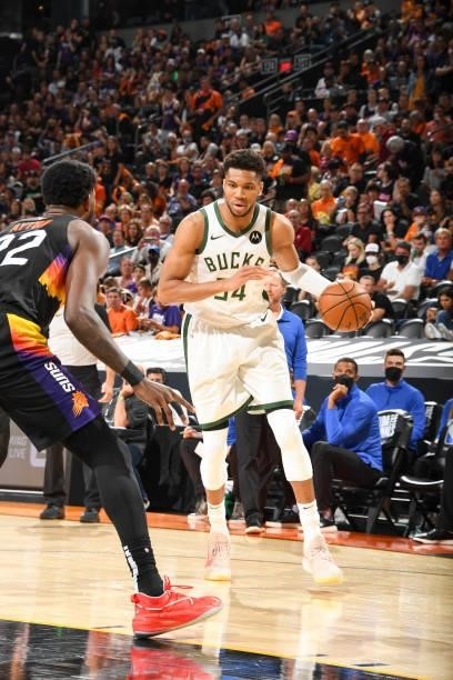 Giannis Antetokounmpo of the Milwaukee Bucks handles the ball during the game against the Phoenix Suns during Game Five of the 2021 NBA Finals on...