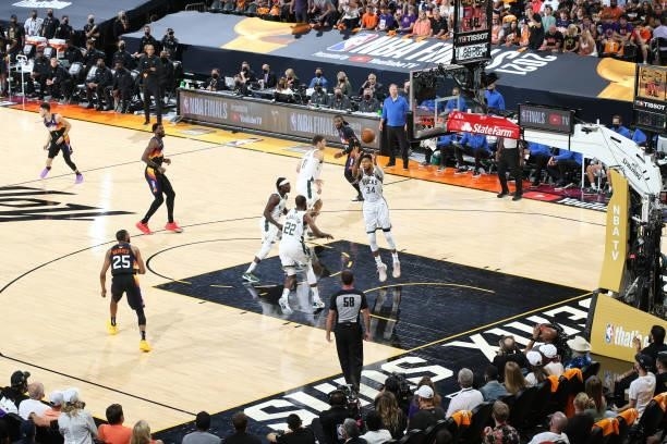 July 17: Giannis Antetokounmpo of the Milwaukee Bucks rebounds the ball against the Phoenix Suns during Game Five of the 2021 NBA Finals on July 17,...