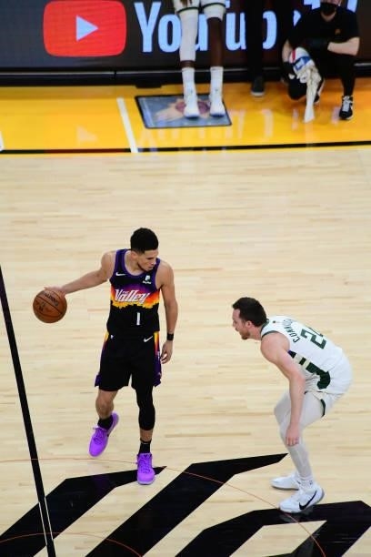 July 17: Pat Connaughton of the Milwaukee Bucks plays defense on Devin Booker of the Phoenix Suns during Game Five of the 2021 NBA Finals on July 17,...