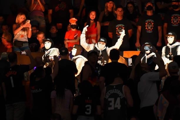 Hip-hop dance crew, The Jabbawockeez perform at half-time during Game Five of the 2021 NBA Finals on July 17, 2021 at Footprint Center in Phoenix,...