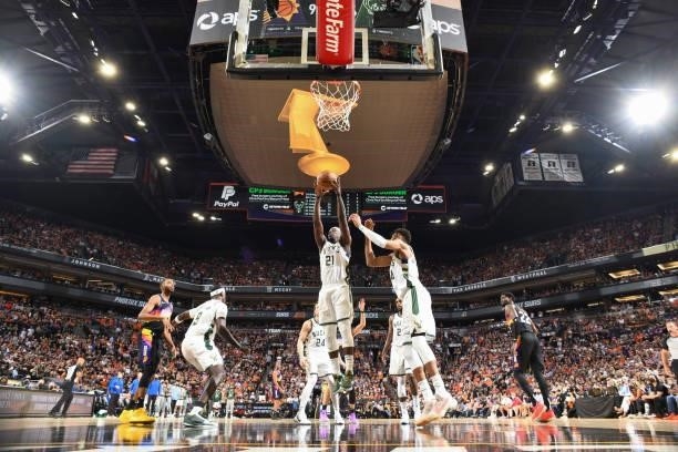 Jrue Holiday of the Milwaukee Bucks rebounds the ball during the game against the Phoenix Suns during Game Five of the 2021 NBA Finals on July 17,...