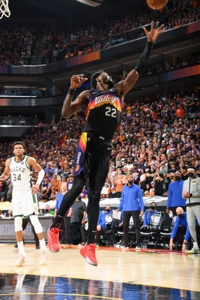 Deandre Ayton of the Phoenix Suns rebounds the ball during the game against the Milwaukee Bucks during Game Five of the 2021 NBA Finals on July 17,...