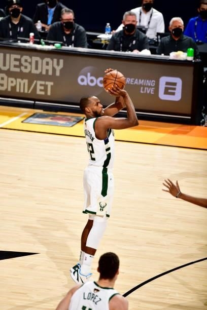 Khris Middleton of the Milwaukee Bucks shoots the ball against the Phoenix Suns on July 17, 2021 during Game Five of the NBA Finals at Footprint...