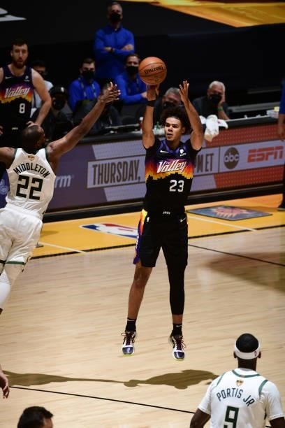 July 17: Cameron Johnson of the Phoenix Suns shoots a three point basket against the Milwaukee Bucks during Game Five of the 2021 NBA Finals on July...