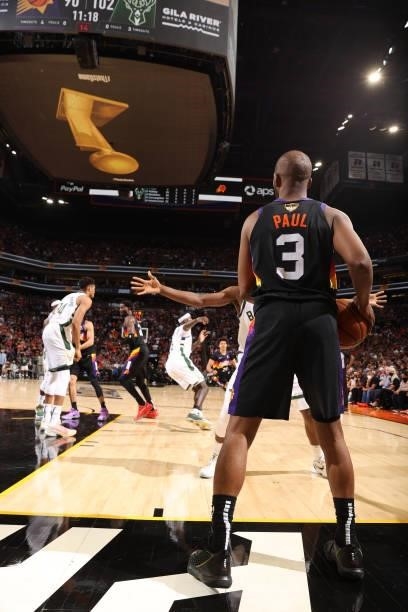 July 17: Chris Paul of the Phoenix Suns passes the ball in against the Milwaukee Bucks during Game Five of the 2021 NBA Finals on July 17, 2021 at...
