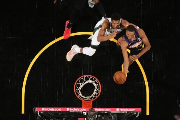 July 17: Mikal Bridges of the Phoenix Suns drives to the basket against the Milwaukee Bucks during Game Five of the 2021 NBA Finals on July 17, 2021...