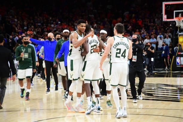 July 17: Giannis Antetokounmpo and Khris Middleton of the Milwaukee Bucks embrace after Game Five of the 2021 NBA Finals on July 17, 2021 at...