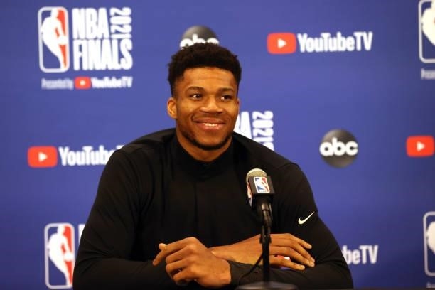 Giannis Antetokounmpo of the Milwaukee Bucks talks to the media after the game against the Phoenix Suns in Game Five of the 2021 NBA Finals on July...