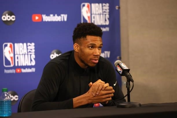 Giannis Antetokounmpo of the Milwaukee Bucks talks to the media after the game against the Phoenix Suns in Game Five of the 2021 NBA Finals on July...