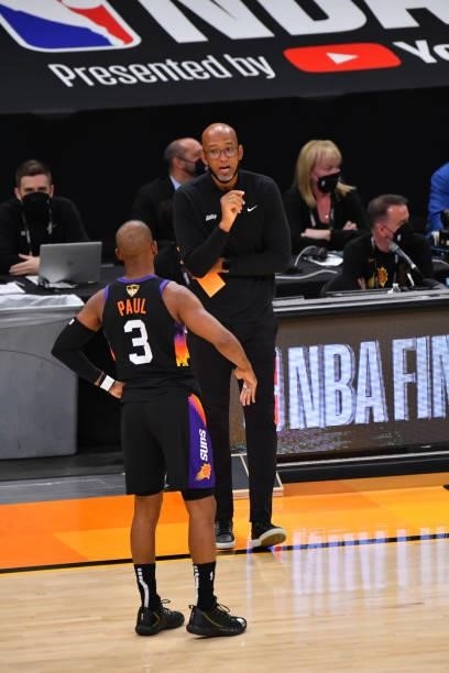 Head Coach Monty Williams and Chris Paul of the Phoenix Suns talk during Game Five of the 2021 NBA Finals on July 17, 2021 at Footprint Center in...