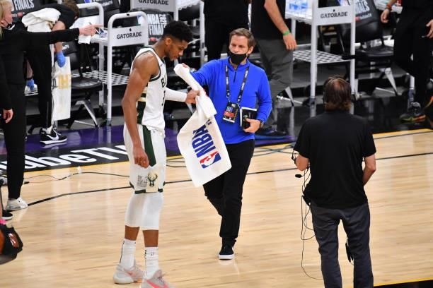 Giannis Antetokounmpo of the Milwaukee Bucks is interviewed after Game Five of the 2021 NBA Finals on July 17, 2021 at Footprint Center in Phoenix,...