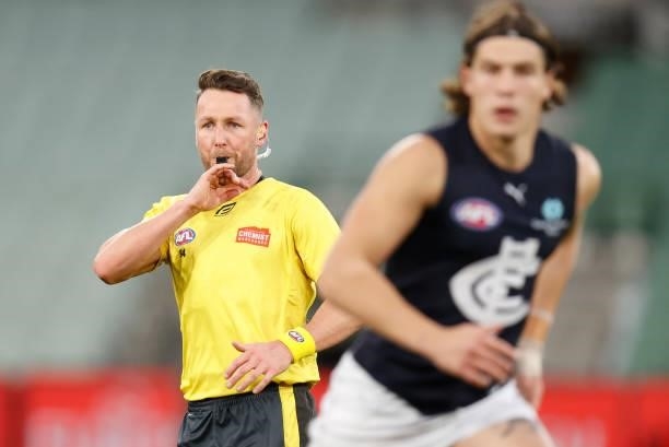 Field Umpire, Brett Rosebury officiating in his 450th match is seen during the 2021 AFL Round 18 match between the Collingwood Magpies and the...