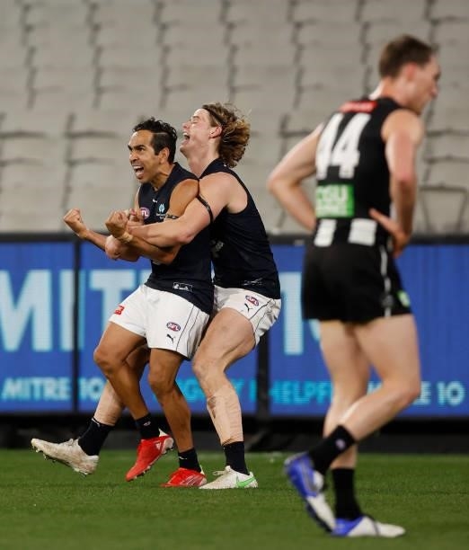 Eddie Betts and Tom De Koning of the Blues celebrate during the 2021 AFL Round 18 match between the Collingwood Magpies and the Carlton Blues at the...