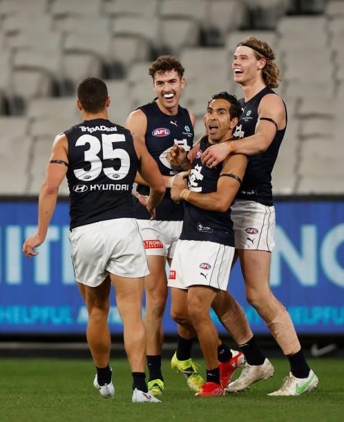 Ed Curnow, Tom Williamson, Eddie Betts and Tom De Koning of the Blues celebrate during the 2021 AFL Round 18 match between the Collingwood Magpies...