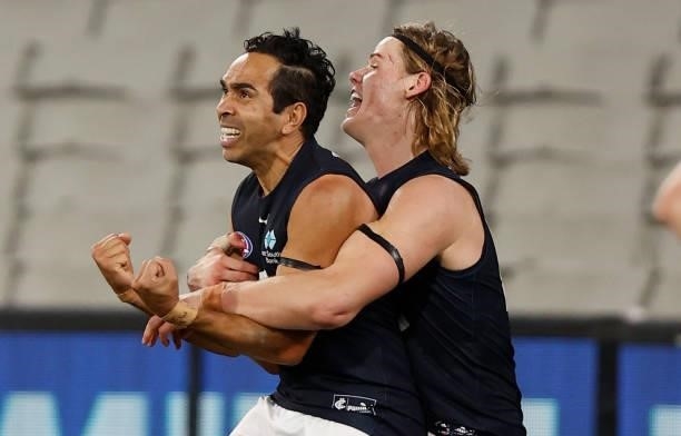Eddie Betts and Tom De Koning of the Blues celebrate during the 2021 AFL Round 18 match between the Collingwood Magpies and the Carlton Blues at the...