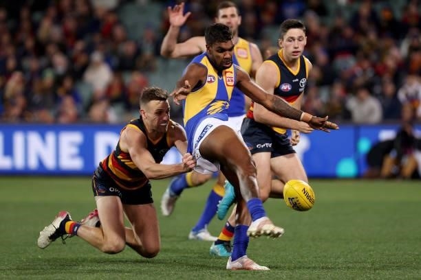 Brodie Smith of the Crows tackles Liam Ryan of the Eagles during the 2021 AFL Round 18 match between the Adelaide Crows and the West Coast Eagles at...