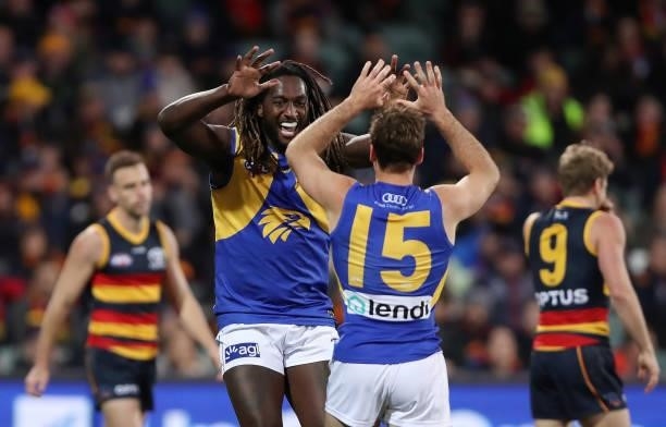 Jamie Cripps of the Eagles celebrates a goal with Nic Naitanui during the 2021 AFL Round 18 match between the Adelaide Crows and the West Coast...