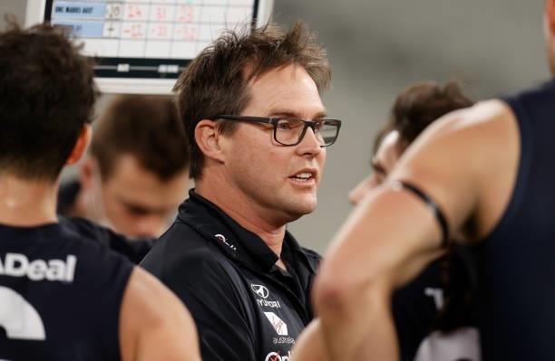 David Teague, Senior Coach of the Blues addresses his players during the 2021 AFL Round 18 match between the Collingwood Magpies and the Carlton...