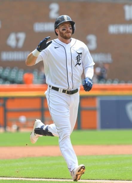 Robbie Grossman of the Detroit Tigers runs the bases after hitting a home run in game one of a doubleheader against the Minnesota Twins at Comerica...