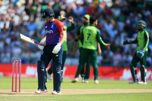 England's Jonny Bairstow heads back to the pavilion after getting out during the second T20 international cricket match between England and Pakistan...