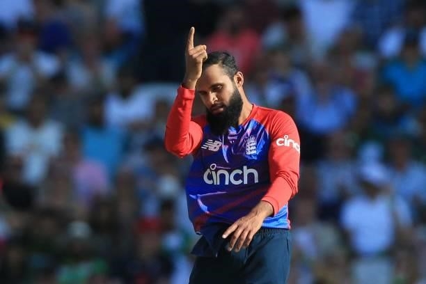 England's Adil Rashid celebrates taking the wicket of Pakistan's Sohaib Maqsood during the second T20 international cricket match between England and...