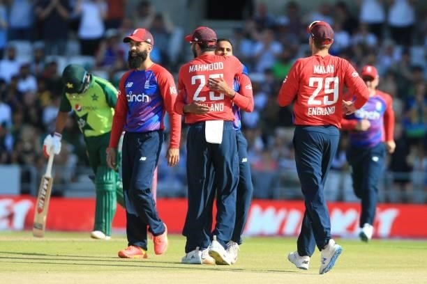 England's Adil Rashid celebrates taking the wicket of Pakistan's Mohammad Rizwan during the second T20 international cricket match between England...