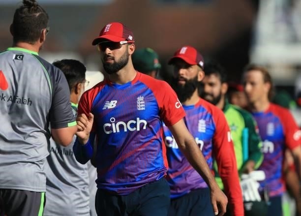 Players including England's Saqib Mahmood leave the field after England won the second T20 international cricket match between England and Pakistan...