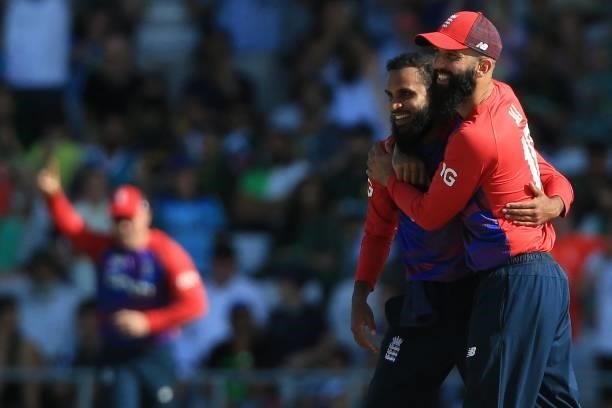 England's Adil Rashid celebrates taking the wicket of Pakistan's Mohammad Rizwan during the second T20 international cricket match between England...