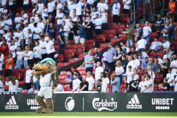 The mascot Leo cheering with fans at the stands prior to the Danish 3F Superliga match between FC Copenhagen and AaB Aalborg at Parken Stadium on...