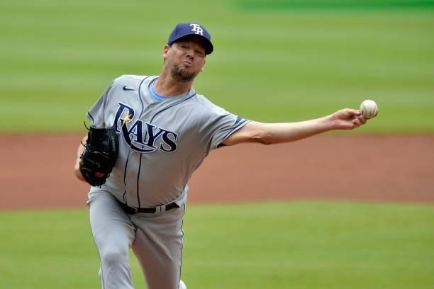 Rich Hill of the Tampa Bay Rays pitches in the first inning against the Atlanta Braves at Truist Park on July 18, 2021 in Atlanta, Georgia.