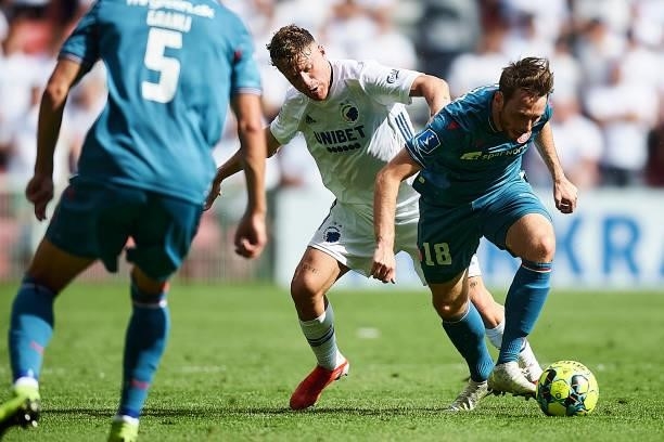 Pep Biel of FC Copenhagen and Louka Prip of AaB Aalborg compete for the ball during the Danish 3F Superliga match between FC Copenhagen and AaB...