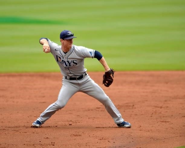 Joey Wendle of the Tampa Bay Rays fields a ground ball to end the sixth inning against the Atlanta Braves at Truist Park on July 18, 2021 in Atlanta,...