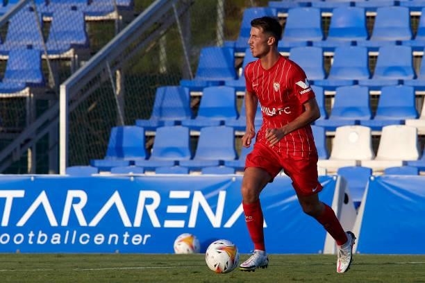 Pedro Ortiz of Sevilla runs with the ball during the pre-season friendly match between Sevilla CF and Coventry City at Pinatar Arena on July 17, 2021...