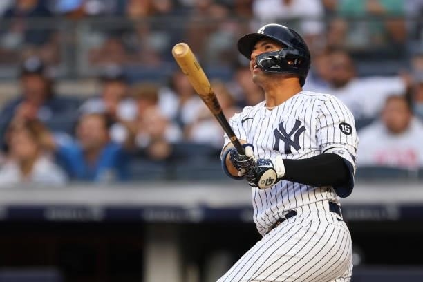 Gleyber Torres of the New York Yankees hits a home run against the Boston Red Sox during the second inning of a game at Yankee Stadium on July 18,...