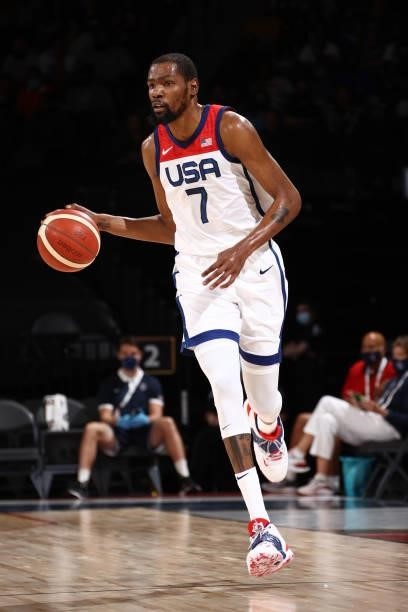 Kevin Durant of the USA Men's National Team dribbles the ball during the game against the Spain Men's National Team on July 18, 2021 at Michelob...