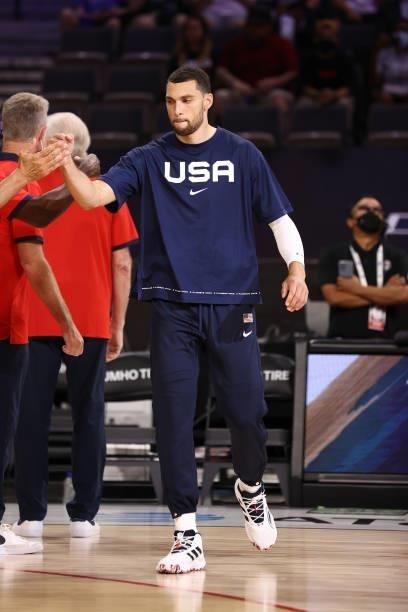 Zach LaVine of the USA Men's National Team high five teammates before the game against the Spain Men's National Team against the Spain Men's National...