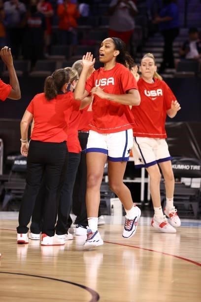 Ja Wilson of the USA Basketball Womens National Team high fives teammates before the game against the Nigeria Women's National Team on July 18, 2021...