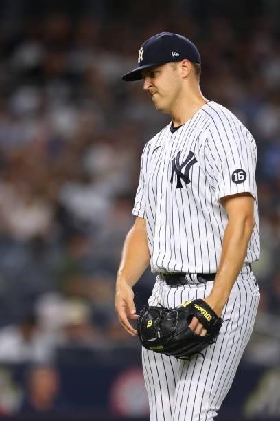 Pitcher Jameson Taillon of the New York Yankees walks off the mound after being relieved in the sixth inning against the Boston Red Sox at Yankee...
