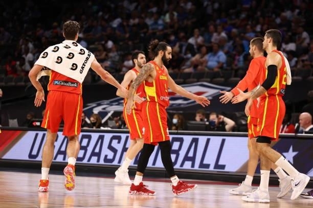 Ricky Rubio of the Spain Men's National Team high fives teammates after the game against the USA Men's National Teamon July 18, 2021 at Michelob...