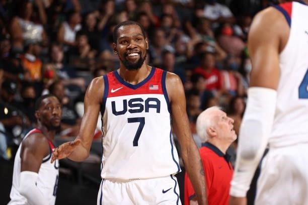 Kevin Durant of the USA Men's National Team smiles during the game against the Spain Men's National Team on July 18, 2021 at Michelob ULTRA Arena in...