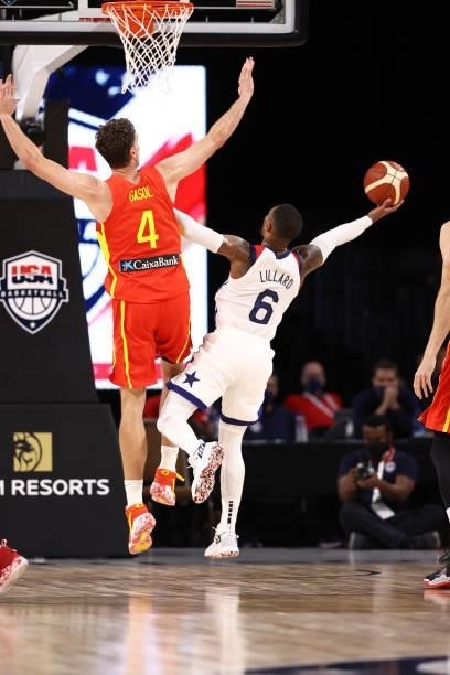 Damian Lillard of the USA Men's National Team drives to the basket against Pau Gasol of the Spain Men's National Team on July 18, 2021 at Michelob...