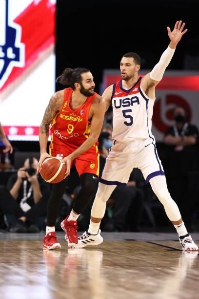 Zach LaVine of the USA Men's National Team plays defense against Ricky Rubio of the Spain Men's National Team during the game on July 18, 2021 at...