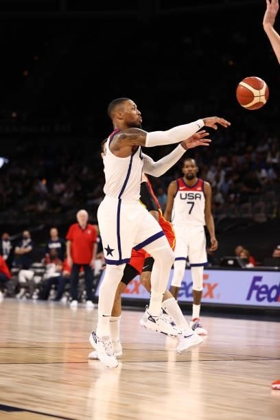 Damian Lillard of the USA Men's National Team passes the ball against the Spain Men's National Team on July 18, 2021 at Michelob ULTRA Arena in Las...