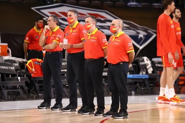 The Spain Men's National Team coaching staff looks on during the anthem before the game against the U.S. Men's National Team on July 18, 2021 at...