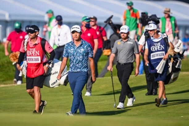 Collin Morikawa walks up the 18th hole fairway during Day Four of the 149th The Open Championship at Royal St. Georges Golf Club on July 18, 2021 in...